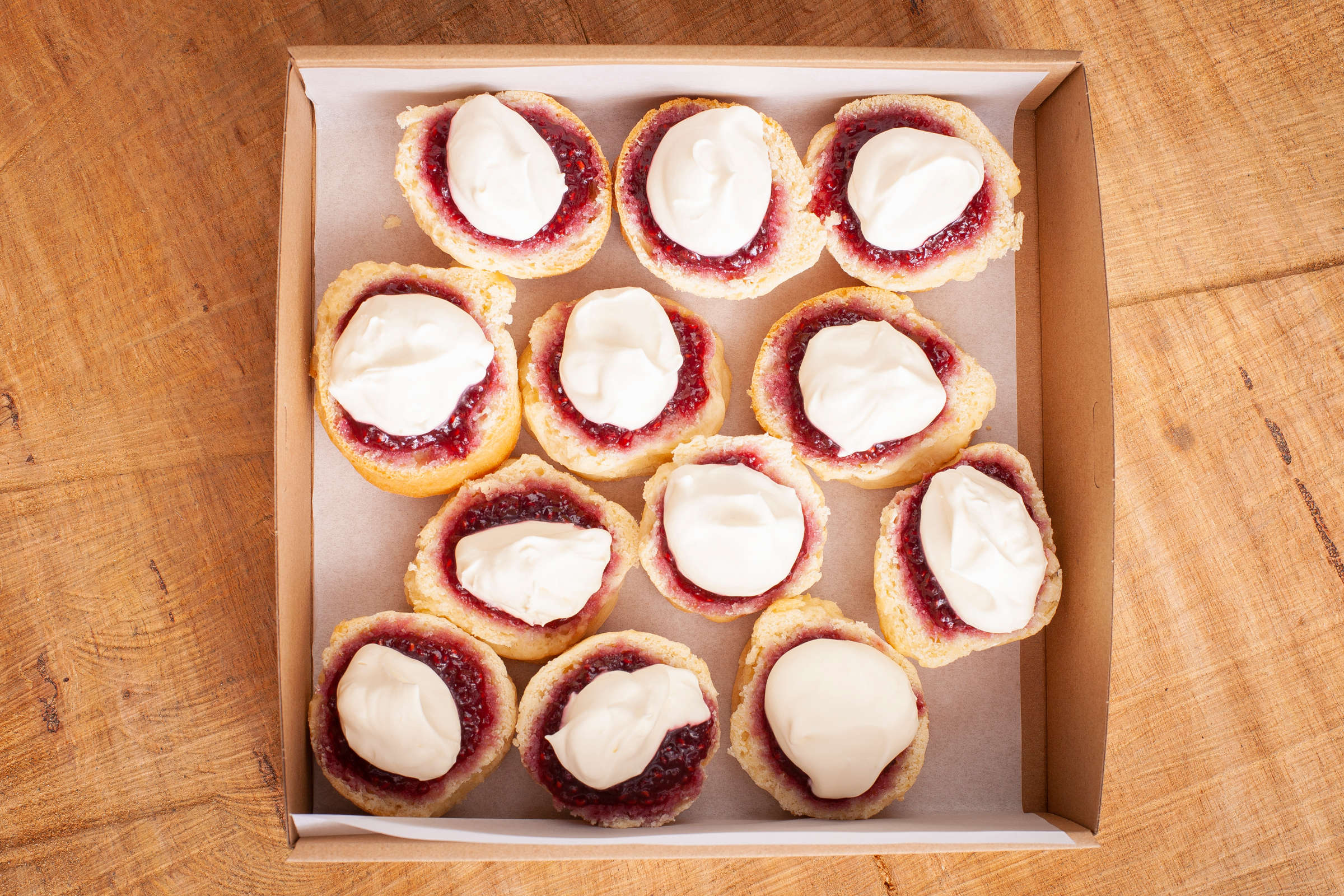 Scones with house-made berry jam and Ashgrove cream catering box. Credit: Richard Jupe.